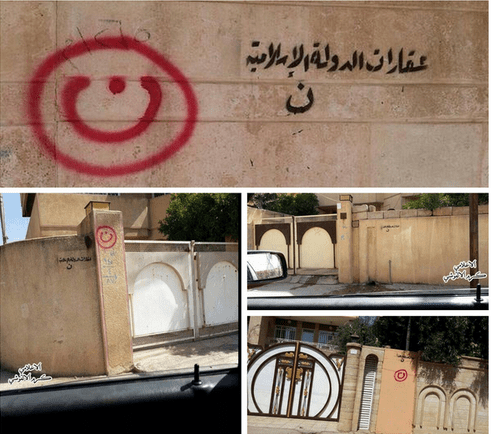 Christian homes in Mosul marked with the Arabic character "ن" (nūn) for Nasara, which is the Qur’an’s word for Christian