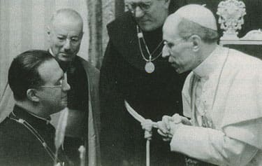 Pope Pius XII receives Msgr. Georges Lemaître, the Belgian priest who proposed the Big Bang theory.